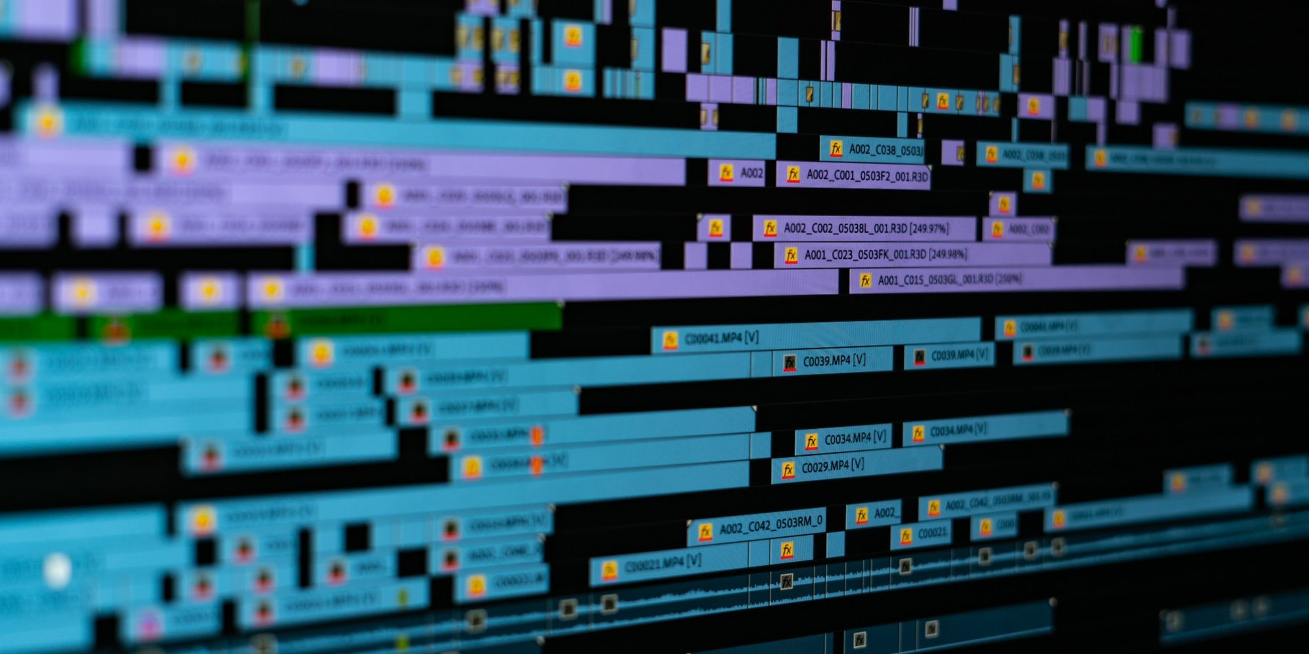 A multi-layer edit timeline: stacked video and audio tracks with clip labels